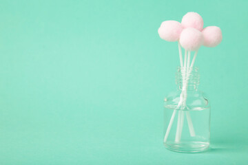 Air freshener on mint. White aroma diffuser bottle with sticks. Minimalism