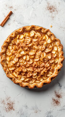 Classic overhead view of a homemade pie with golden crust and cinnamon spices ready to delight dessert lovers