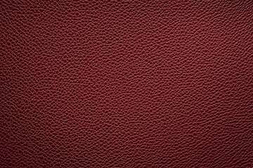 Fototapeta premium Detailed Close-Up of Soft Red Leather Texture Featuring Subtle Grain Patterns Ideal for Backgrounds and Design Projects