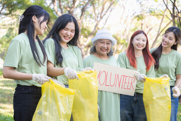 Group of Volunteers Engaged in Cleanup Activity, Eco Volunteers Collecting Plastic Waste in Park,...