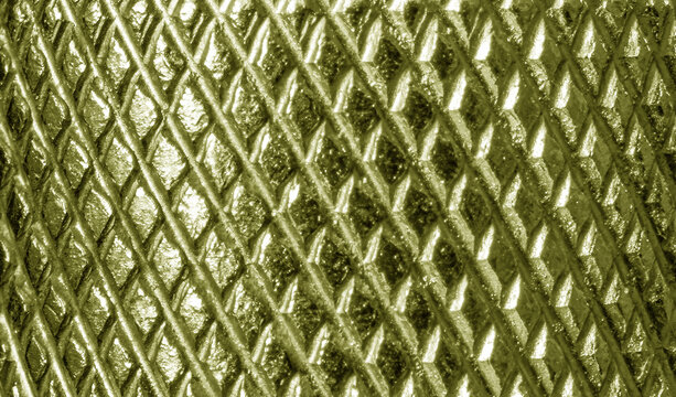 Golden texture with diamond pattern. Abstract metallic background.