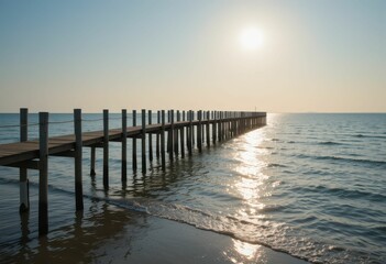 Obraz premium Serene Sunset Over Wooden Pier Extending Into Calm Ocean Waters