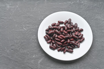 boiled beans on a white plate