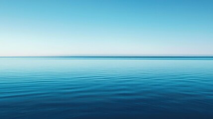 Fototapeta premium Abstract landscape background concept. Tranquil blue sea horizon with calm water and clear sky, perfect for peaceful backgrounds.