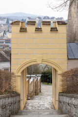 Decorative gate to area surrounding baroque monastery Melk Abbey on hill above town, Melk, Austria