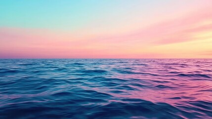 Obraz premium Seascape abstract background concept. Serene ocean waves beneath a colorful twilight sky at sunset.