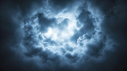 Fototapeta premium Dark swirling storm clouds with glowing light breaking through. Weather and dramatic sky concept