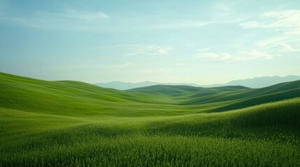 Naklejka premium Rolling green hills under a clear sky