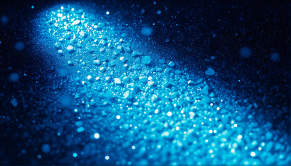 Naklejka premium A soft-lit composition of blue crystals dispersed over a dark surface, glowing with an ethereal, luxurious shimmer.