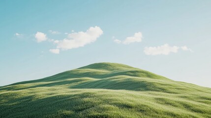 Gentle, rolling green hill under a clear blue sky with scattered clouds