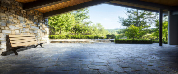 Scenic view from a spacious patio overlooking lush greenery and a serene landscape