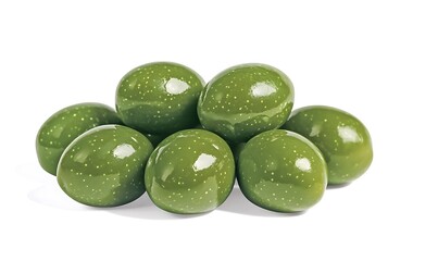Glossy green candies shaped like eggs arranged in a pile.