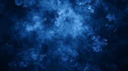 Fototapeta premium Dark blue abstract background with a textured, smoky appearance.