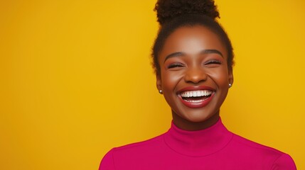 Joyful African American woman in pink, radiating optimism and cheerfulness
