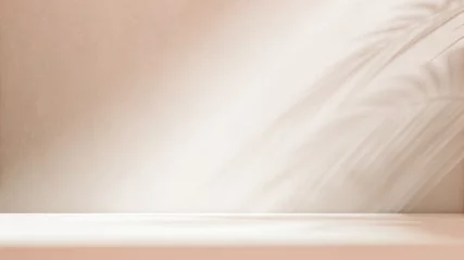 Fototapete Badezimmer Blurred shadow from palm leaves on the light beige wall. Minimal abstract background for product presentation. Spring and summer.  © Laura Pashkevich