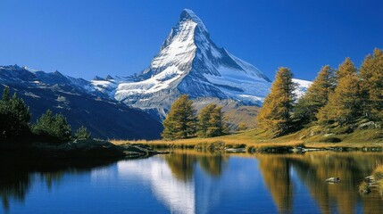 Fototapeta premium Majestic Matterhorn reflected in a serene alpine lake.