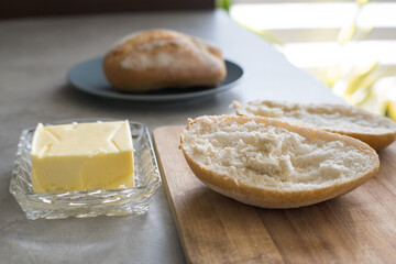Meal preparation, bread and butter.
