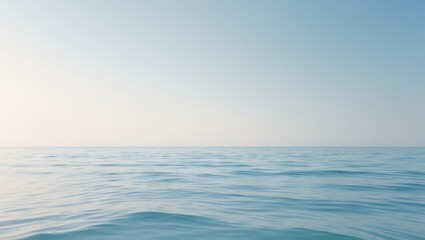 Fototapeta premium Tranquil Blue Ocean and Clear Sky with Gentle Reflection of Light