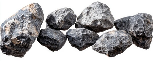 Fototapeta premium A collection of various sized rocks, showcasing different textures and colors, likely used for landscaping or decorative purposes.