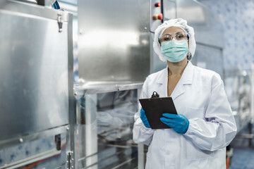 Industry inspector team working, QC staff work checking machine operation for safety and hygiene