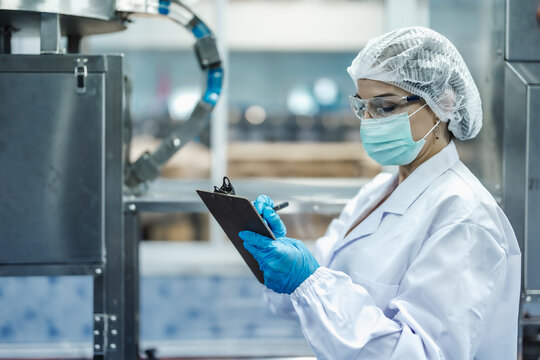 Industry inspector team working, QC staff work checking machine operation for safety and hygiene