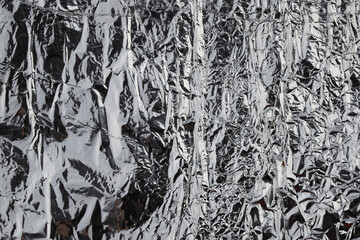 textured metal surface in dark gray color, background	