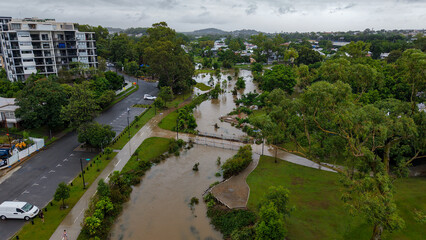 Aerial View of Flooded Park and Residential Area After Heavy Rainfall in Greenslopes during Cyclone...