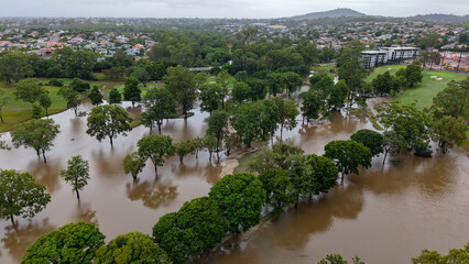 Aerial View of Flooded Park and Residential Area After Heavy Rainfall at Carindale Golf Course...
