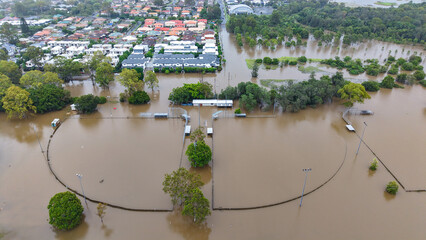 Aerial View of Flooded Park and Residential Area After Heavy Rainfall at Minnippi Parklands in...