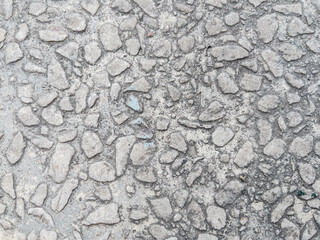 Closeup of textured pebble concrete wall surface as background