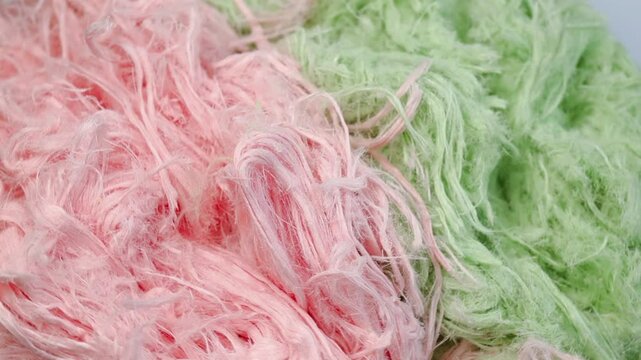 Turkish traditional dessert pismaniye, rotation in circle. Iranian pashmak, Turning. green and pink dragon beard. easter dessert
