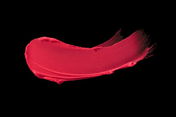 Lipstick or creamy bluster smudge swatch isolated on black background