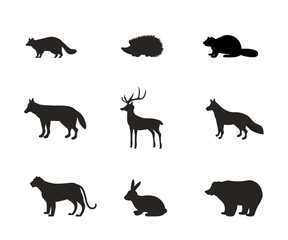 Wild animal silhouettes in black, including raccoon, hedgehog, beaver, wolf, tiger, fox, deer, hare, and bear. Minimalistic woodland wildlife icons. Cartoon vector illustrations set isolated on transp