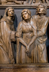Fototapeta premium Puget Theniers, FRANCE, 02-17-2025: Wood sculpture (19th century) of Virgin Mary at the entombment of Christ.