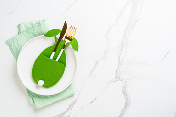 Easter table decor at white background.