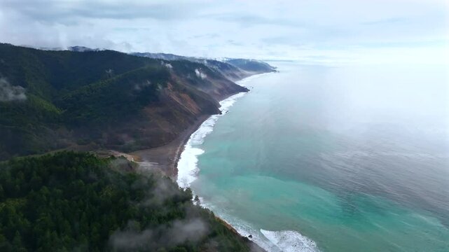 USAL Beach Sinkyone Wilderness Lost Coast Trail Redwood Forest California aerial drone rugged untouched coastline rain mist morning remote untouched waves crashing bluffs mountainside camping upwards