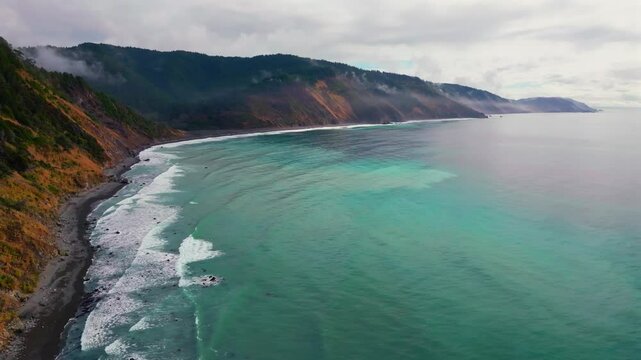 USAL Beach vibrant Pacific Ocean landscape scene Sinkyone Wilderness Lost Coast Trail California aerial drone rugged untouched coastline rain mist morning remote untouched waves crashing circle left