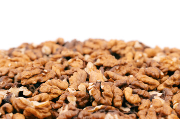 Walnut kernels isolated on white background. Walnuts close-up. Healthy eating. Half of walnut isolated. Peeled walnut on white.