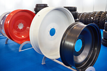 Red, black and white pressed rims for tractor © Sergey Ryzhov