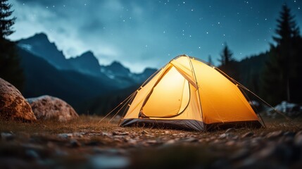A serene camping setup featuring a glowing yellow tent against a breathtaking mountain backdrop under a celestial blanket of stars, perfect for nature lovers and explorers.