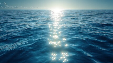 Fototapeta premium Bright blue water surface with smooth ripples reflecting warm sunlight