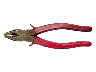 Closeup of wellused pliers with red handles against a white background.  Shows signs of wear and...