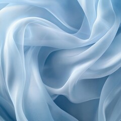 Obraz premium Light blue sheer fabric drapes beautifully