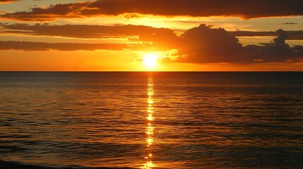 Naklejka premium Golden sunset over calm ocean