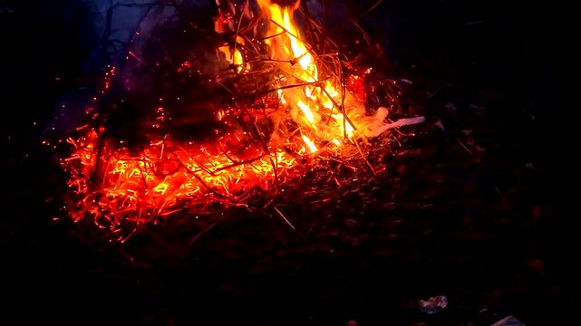 A fire burning outside ash danger