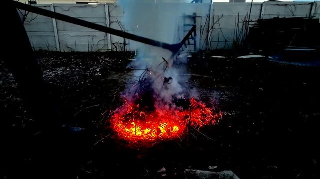A fire burning outside ash danger