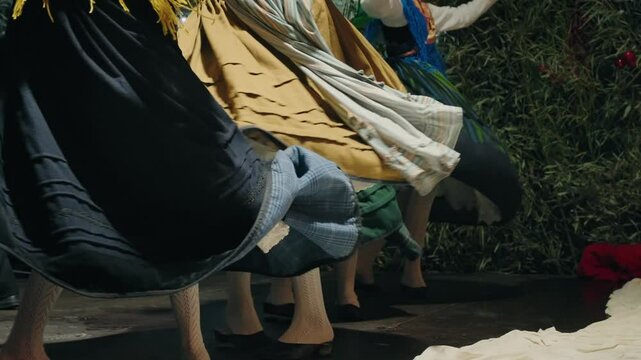Colorful skirts twirl during a vibrant Portuguese folklore dance performance