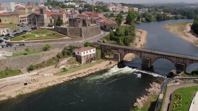 Aerial view of Barcelos medieval bridge over the C&aacute;vado River and historic center