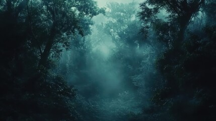 Obraz premium Atmospheric Misty Forest Ethereal Landscape of Fog-Shrouded Trees in Blue-Green Hues.