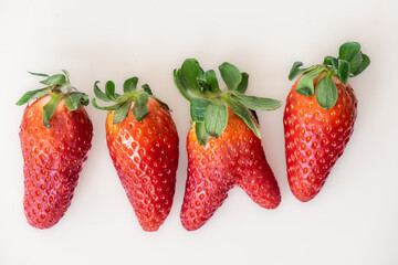 strawberries on white background. strawberries in the foreground with white background	